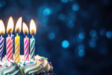 A close-up of colorful birthday candles on top of a cake, with a blurred background of a dark blue wall highlights the flame as it flickers against the deep navy backdrop Generative AI