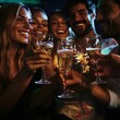© Togrul - Friends celebrate with champagne.