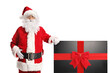 © Ljupco Smokovski - Santa claus with a tv screen present