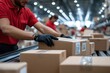 © Milos - A worker in a red uniform and gloves carefully handling a package, representing safety, professionalism, and careful shipping processes within a distribution center.