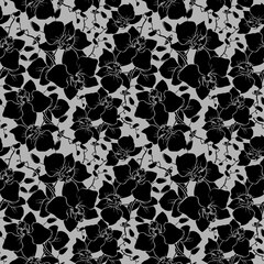 Wall Mural - seamless pattern of large black silhouettes of orchids on a gray background, texture, design