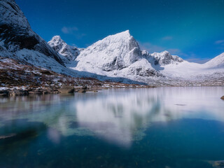 Wall Mural - lofoten islands, norway. panoramic landscape. moon light. long exposure photography. reflection on t
