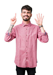 Wall Mural - Young handsome man wearing pink shirt over isolated background showing and pointing up with fingers number six while smiling confident and happy.