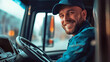 © Birgit Reitz-Hofmann - Laughing Truck driver smiling inside truck cab
