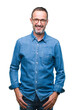 © Krakenimages.com - Middle age hoary senior man wearing glasses over isolated background with a happy and cool smile on face. Lucky person.