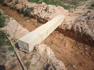 photo of stakes cut over the river as a simple bridge