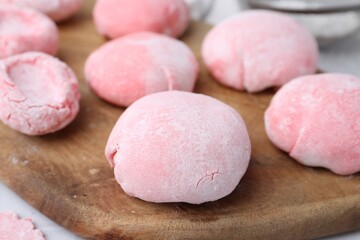 Tasty homemade mochi on white table, closeup