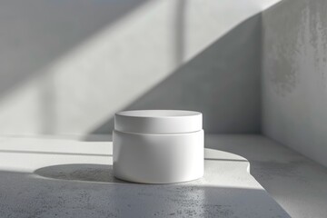 Poster - White jar container on a white background with soft shadows from natural light.