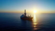 © Worakit - Aerial view of oil rig surrounded by calm ocean waters at sunset, showcasing serene beauty of sea and industrial structure