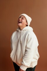 Canvas Print - Laughing sweatshirt white studio shot.