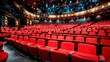 © upnowgraphics - Empty Red Seats in a Theater Auditorium