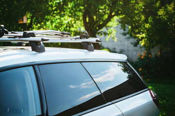 Empty bike rack on car roof awaiting a journey