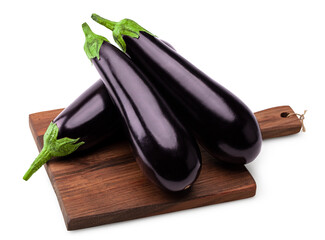 Wall Mural - eggplants on rustic kithen wooden board isolated on white background. clipping path