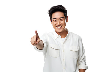 Smiling Asian man pointing to empty copy space with enthusiasm and joy