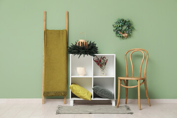 Sticker - Interior of living room with shelving unit decorated for Christmas celebration