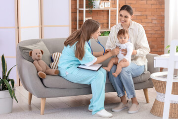 Poster - Female pediatrician with stethoscope listening to little baby and mother at home