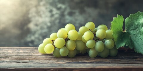 Poster - A cluster of fresh, ripe green grapes on an aged wooden table.