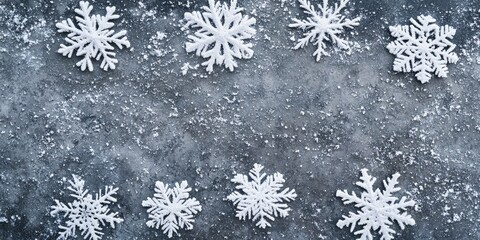Wall Mural - Christmas or winter backdrop. Snowflakes on a gray concrete surface. Copyspace.