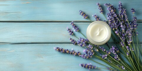 Poster - cosmetic creams and lavender blooms on a blue wooden surface