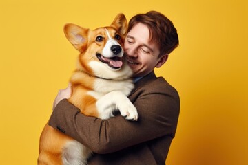 Poster - American middle age man hugging pembroke welsh corgi pet portrait mammal.