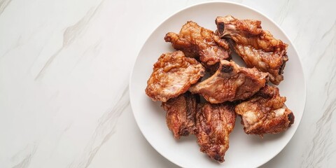 Poster - Fried and extremely dry pork on a white porcelain plate with copy space.