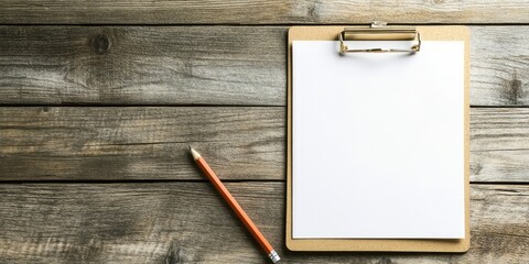 Poster - A blank clipboard with a pencil on a wooden surface. Copyspace, top view.
