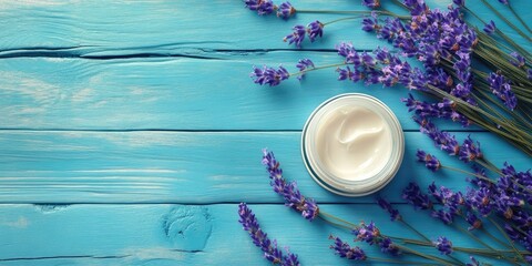 Poster - cosmetic creams and lavender blooms on a blue wooden surface