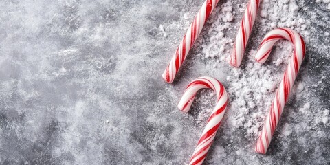 Aufkleber - Hard candy canes on a grey concrete surface. Christmas decoration.