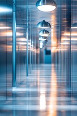 Poster - A modern, illuminated hallway featuring metallic walls and overhead lights, creating a sleek and reflective atmosphere.