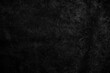 © Lu-sound - Black velvet texture with a smooth and matte surface, featuring deep and rich black tones and minimal light reflection, ideal for dark fabric backgrounds or elegant design references