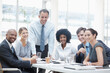 © STEEXBuyout/peopleimages.com - Corporate, diversity and portrait of business people in boardroom of office together for management. Collaboration, meeting or strategy with smile of man and woman employee group in workplace