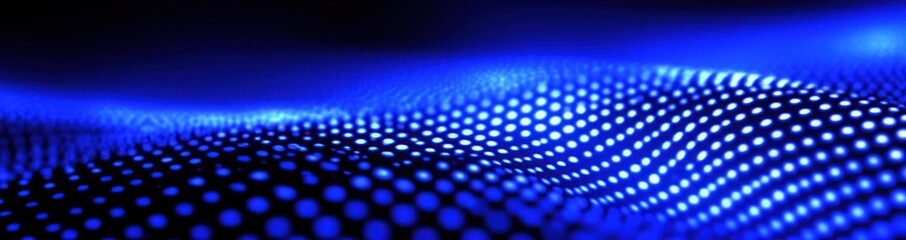 Abstract blue glowing dots in a wave pattern.