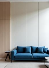 Poster - A sleek blue sofa is positioned against a paneled wall in this minimalist loft's modern living room design.