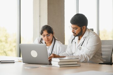 University, education, medicine, anatomy concept. Multiracial indian medical students in classroom, studying