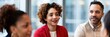 © Vilaysack - Diverse group of professionals engaged in a lively discussion at a modern office, showcasing teamwork and collaboration in a corporate setting.