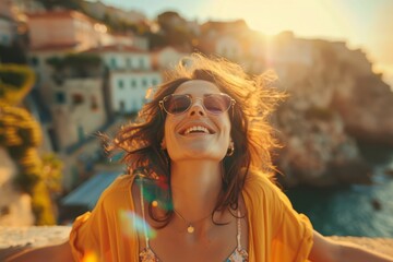 Smiling woman in sunglasses enjoying sunset near coastline. Summer vacation and travel concept