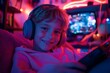 © аska - Smiling European boy with headphones gaming