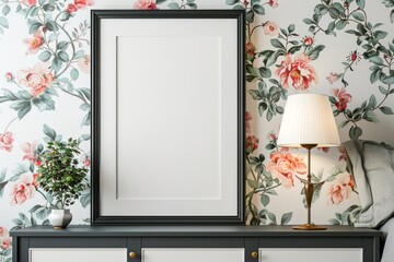 a sleek black frame mockup on sideboard, side to wall, next to bedside lamp, minimal surrounding, fl
