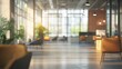 © 69 - Blurred view of a modern, empty open-space office with natural lighting and sleek furniture, creating a professional, minimalist vibe