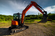 © yanik88 - Small-sized construction special equipment in a natural location. The concept of using not full-size equipment