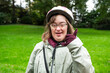 © Werner - Outdoor portrait of a happy 42 yo woman with Down Syndrome, Tienen, Flemish Brabant, Belgium