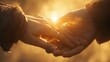 © peerawat - intertwined hands, with the warm rays of the rising sun shining between their fingers and illuminating the soft morning mist around them.
