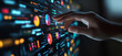 © IBEX.Media - Hand interacting with data visualizations on a digital interface, representing real-time analytics, data analysis, and technology in a futuristic environment