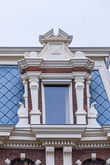 Villa (1884), consisting of three residential buildings in the Flemish Renaissance style with two corner towers and bay windows on Weteringschans 10 - 14. Amsterdam, The Netherland. 