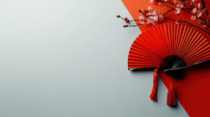 Red Chinese fan on a white background