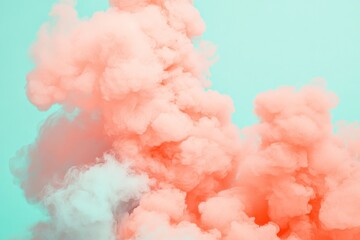 Leinwandbilder - A dynamic composition of bright orange smoke billowing dramatically against a clear blue sky, creating a visually compelling and energetic contrast of colors.