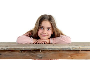 Poster - A young girl sitting comfortably on a wooden table, possibly in a home or office setting