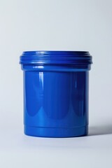 Poster - A blue container sits on a white surface, great for product or packaging design