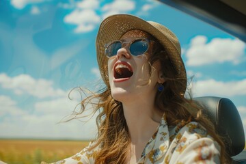 Sticker - A woman wearing a hat and sunglasses driving a car on a sunny day