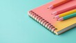 © Kulvarin - Realistic 3D composition notebook with pens and highlighters resting on it, soft shadows, closeup, vibrant colors